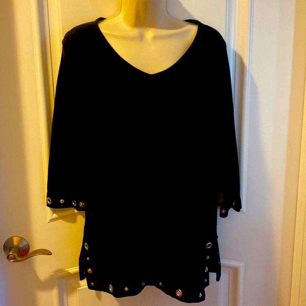 Black casual top with silver rivet and rings on sleeves and hem